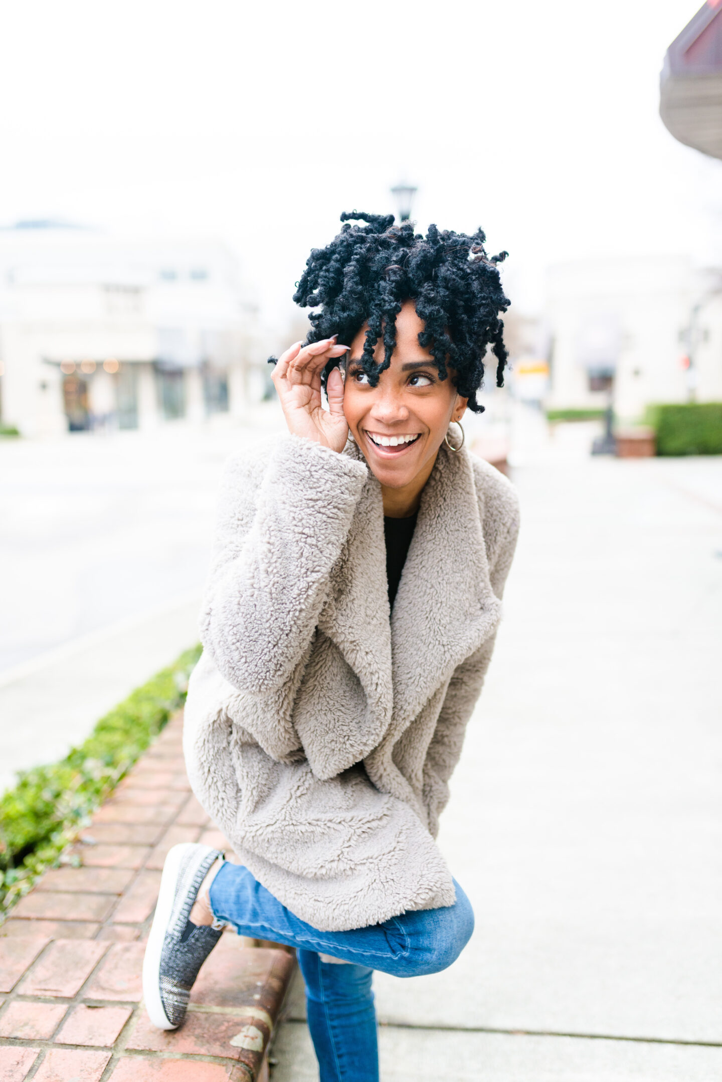 woman wearing grey sweater