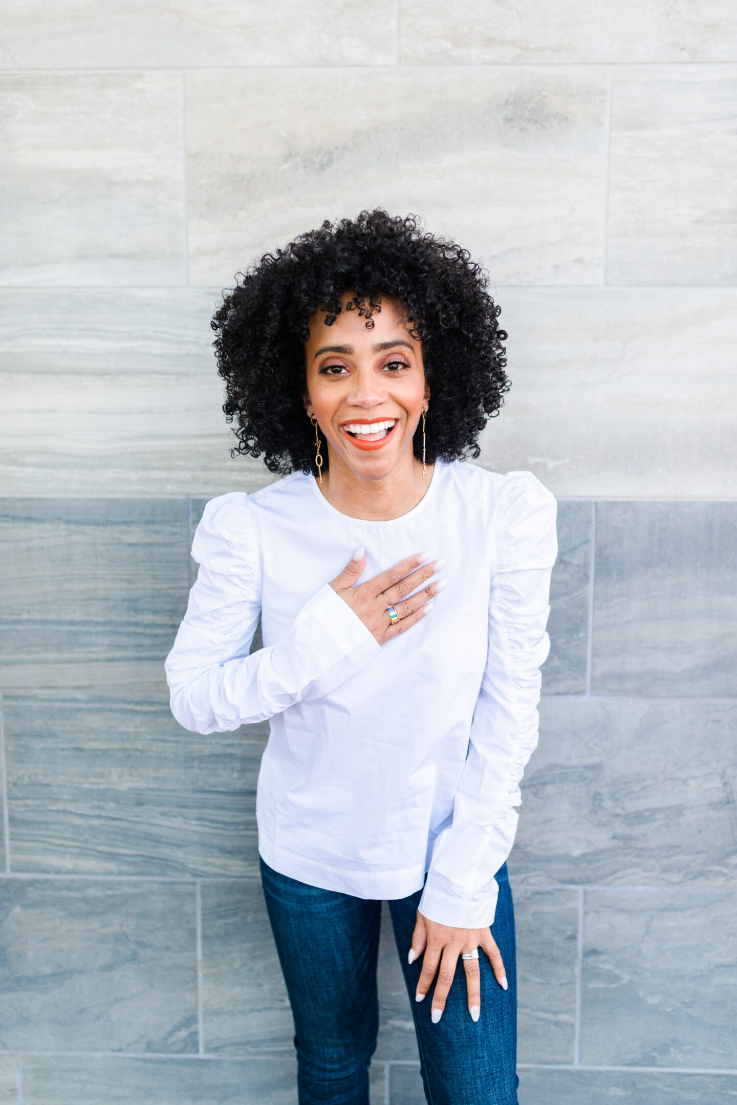 woman wearing white top and sharing Prime Day 2020 Shopping Guide