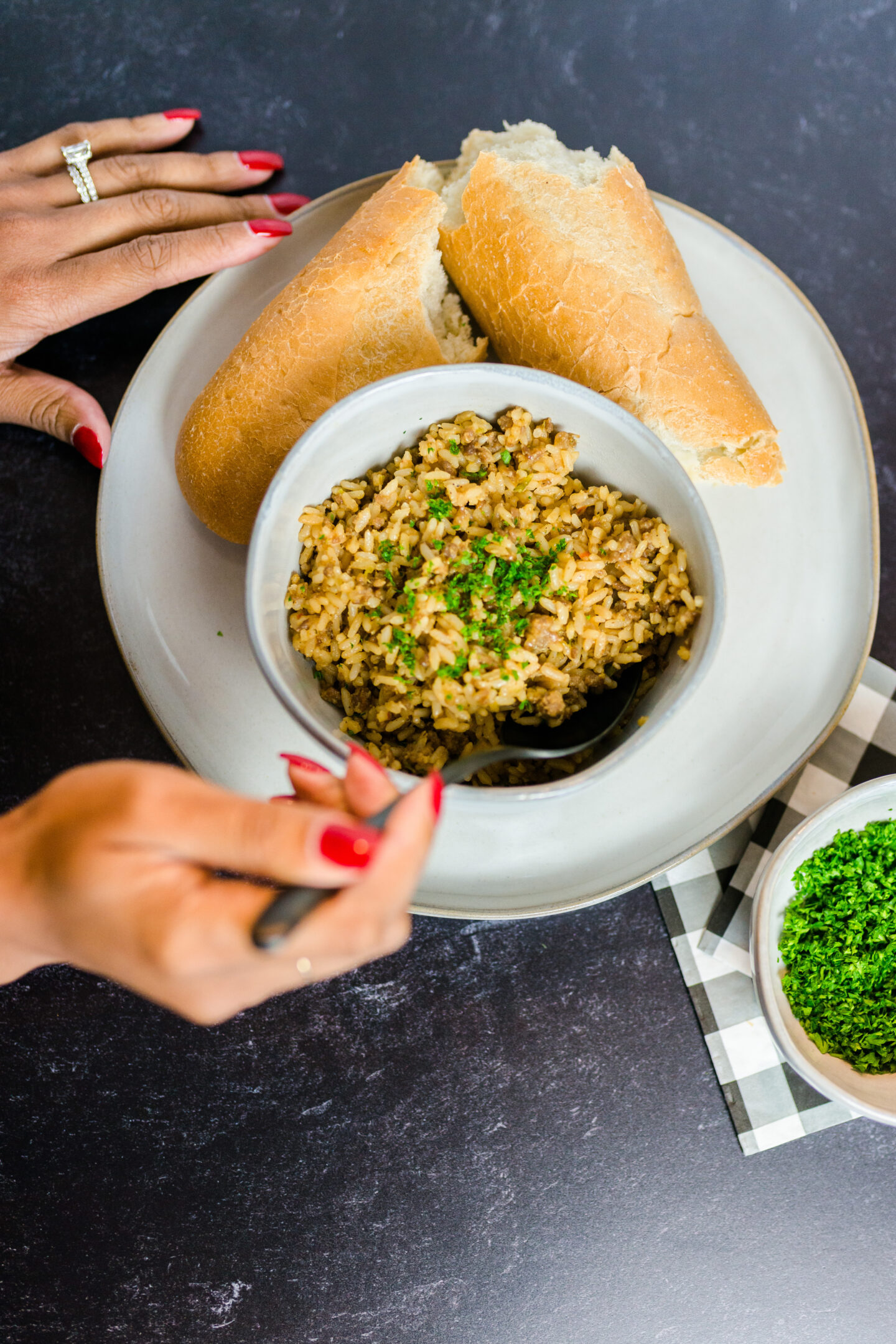 person preparing Thanksgiving Dirty Rice Recipe