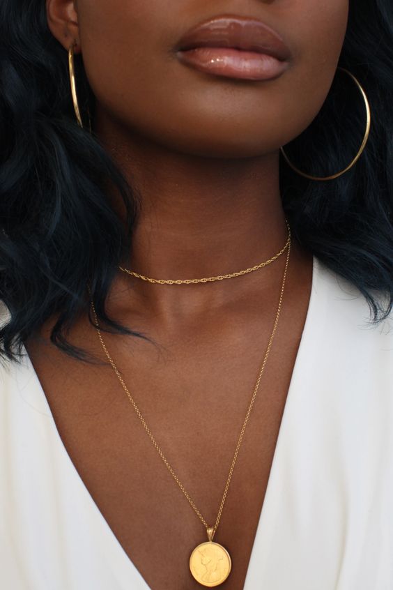 woman wearing hoop earrings and necklace for Zoom Ready Jewelry